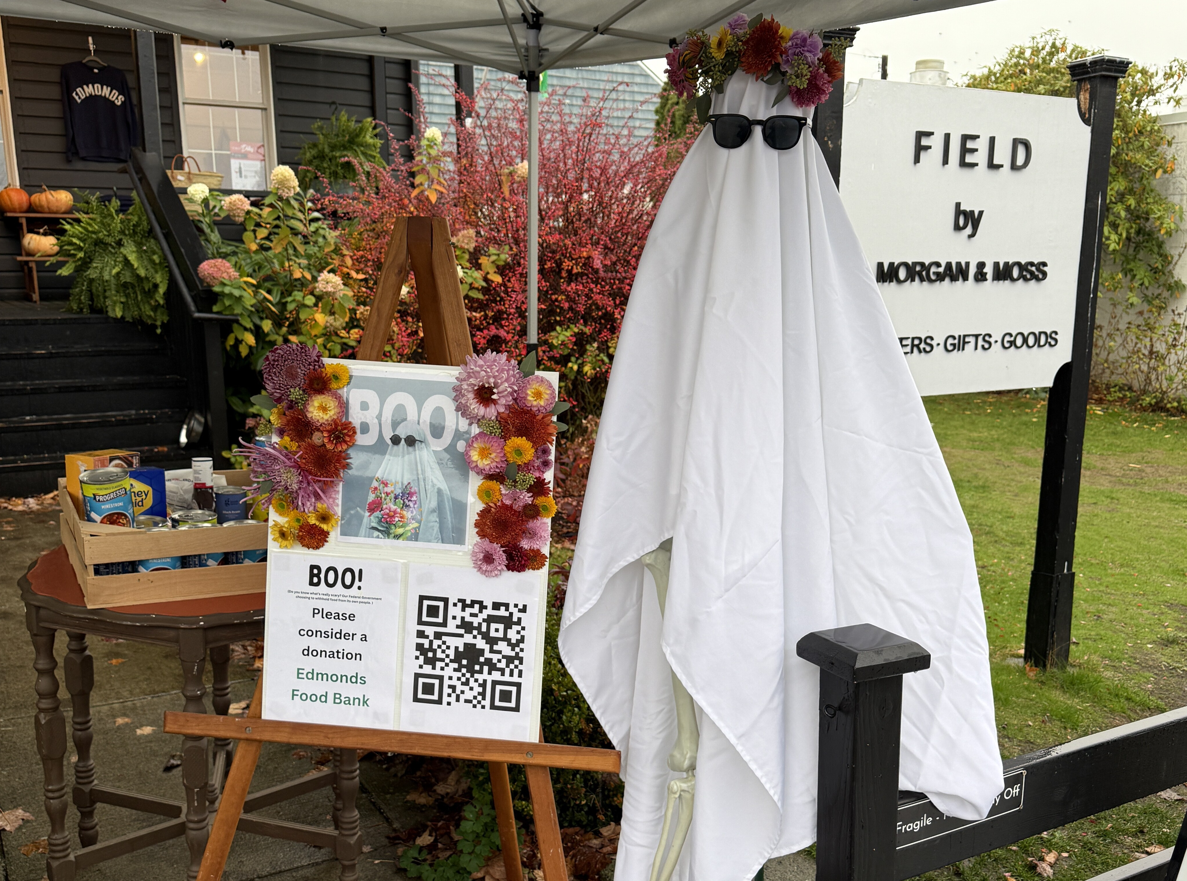 caption: The Halloween display outside FIELD by Morgan &amp; Moss, an Edmonds-based flower shop that is raising money for the Edmonds Food Bank.  