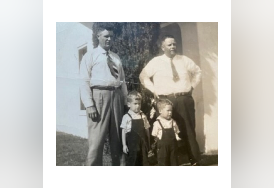 caption: The author's grandfather Rotchley Jones (left) and father Aaron Jones (lower right) around age two, likely photographed in Portland, Oregon in 1947.