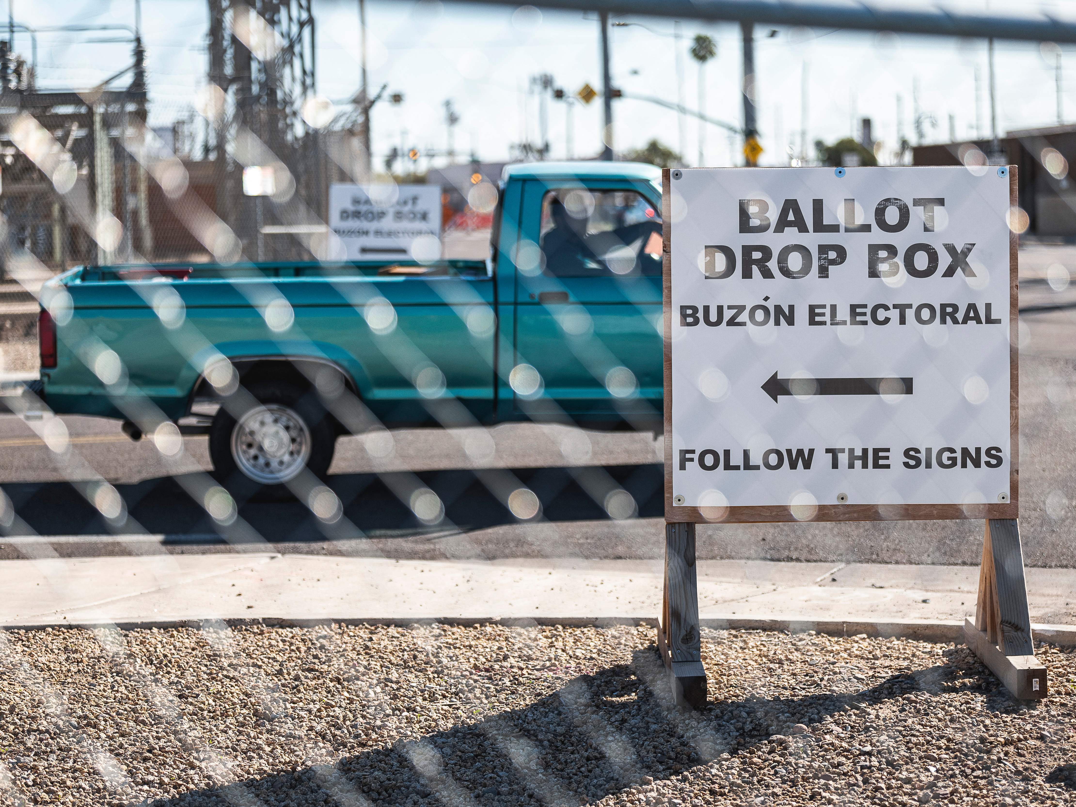 caption: Fences surround the Maricopa County Tabulation and Elections Center (MCTEC) in Phoenix, Arizona, on Oct. 25, 2022, to help prevent incidents and pressure on voters at the ballot drop box.
