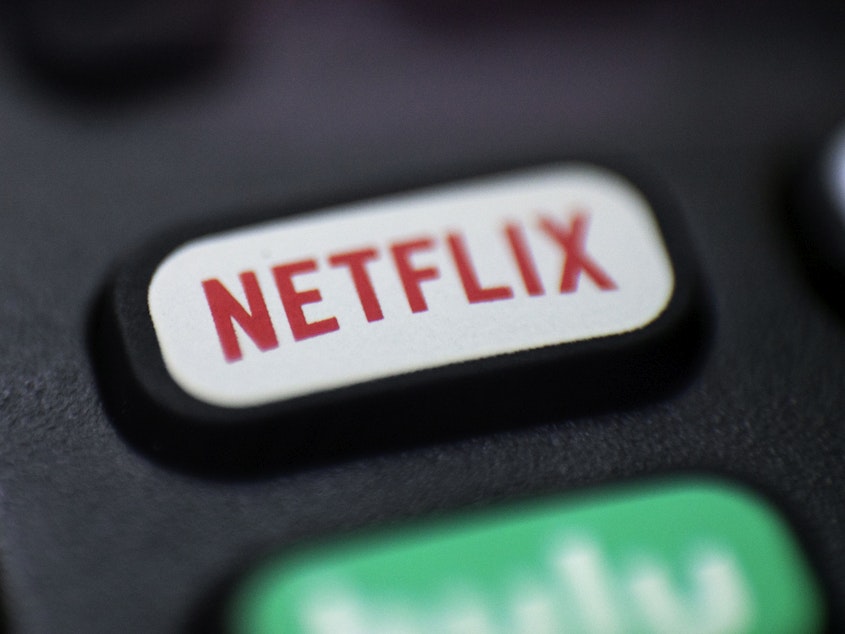 caption: Netflix is testing a way to crack down on password sharing. The streaming service has been asking some users of the popular streaming site to verify that they live with the holder of the account.