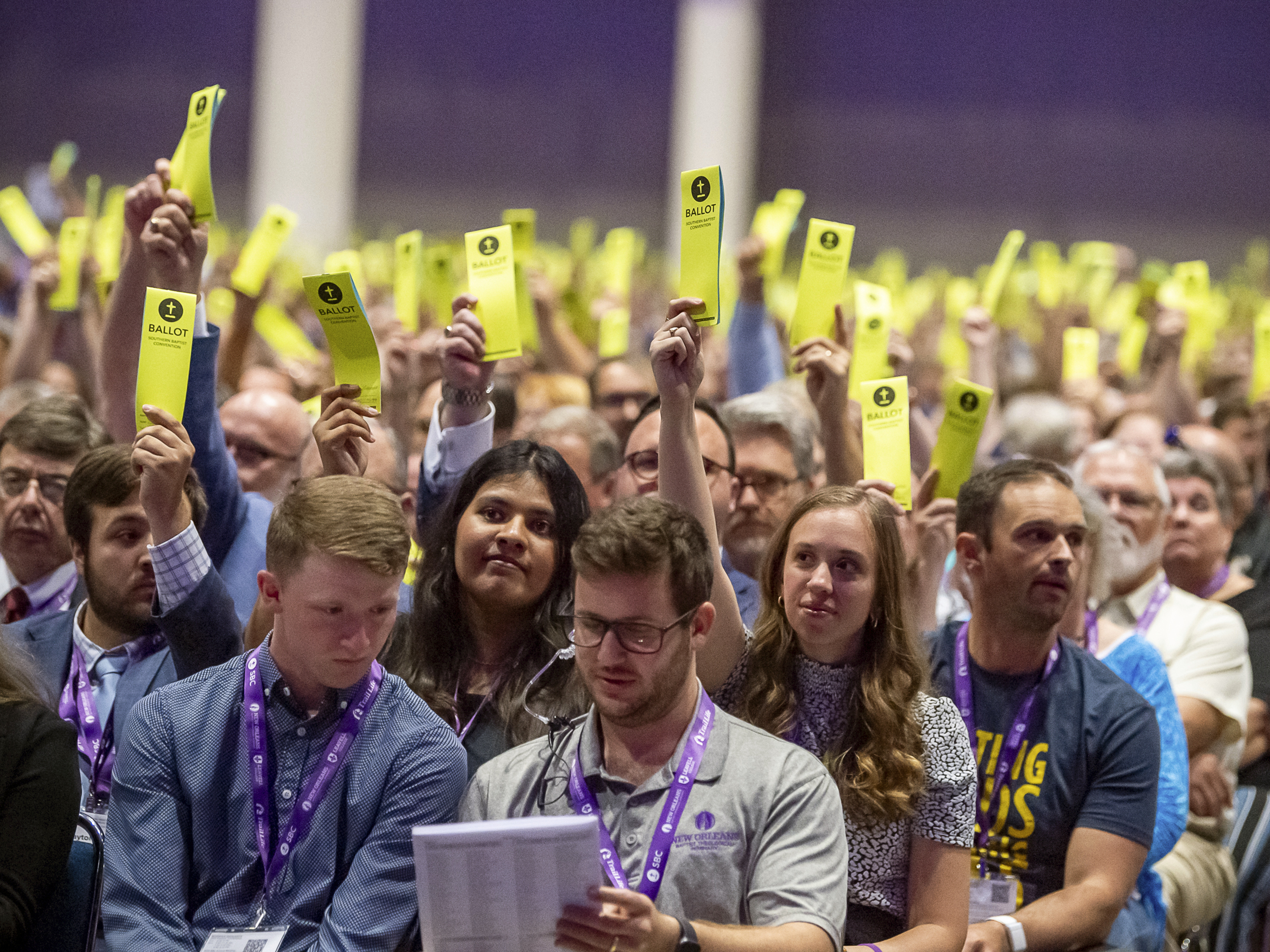 caption: FILE - Delegates hold up their ballots at the Southern Baptist Convention in New Orleans on June 13, 2023. On Tuesday, Sept. 19, 2023, Southern Baptist leaders ousted an Oklahoma church whose pastor defended his blackface performance at one church event and his impersonation of a Native American woman at another.