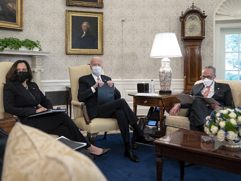 caption: President Biden and Vice President Harris meet with Senate Majority Leader Chuck Schumer and other Democratic senators Wednesday to talk about Biden's $1.9 trillion COVID-19 relief proposal.
