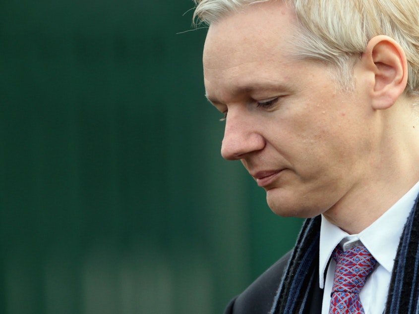 caption: WikiLeaks founder Julian Assange could soon be facing criminal charges from the Department of Justice, according to language discovered in an unrelated court document by terrorism researcher Seamus Hughes.