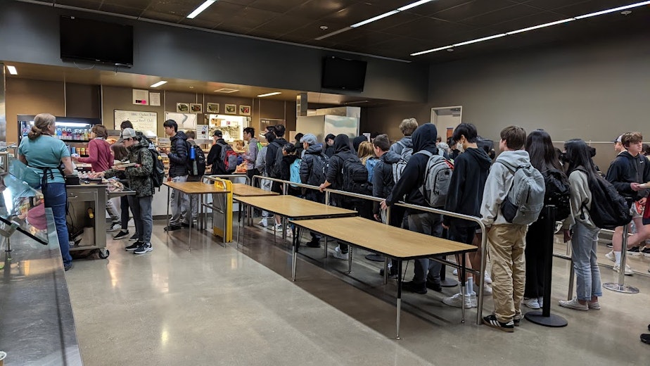 caption: A long line for lunch forms at Issaquah High School. With the expansion of universal lunch programs, the Issaquah School District has seen an increase in the number of students getting lunch at school this year.
