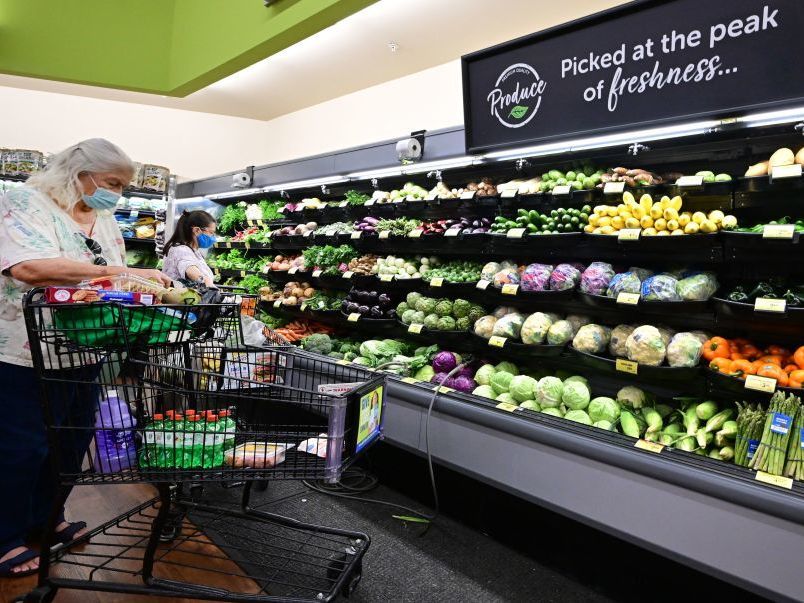 caption: The U.S. food system makes junk food plentiful and cheap. Eating a diet based on whole foods like fresh fruit and vegetables can promote health - but can also strain a tight grocery budget. Food leaders are looking for ways to improve how Americans eat.