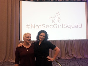 caption: Liese Siegenthaler (left) and Maggie Feldman-Piltch attended the recent conference. #NatSecGirlSquad creates opportunities for networking and mentorship and provides professional development support to women at various stages of their national security careers.