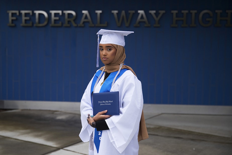 caption: Khadija Hussein, a senior at Federal Way High School, stands for a portrait on Wednesday, May 20, 2020, in Federal Way.