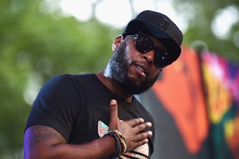 caption: Talib Kweli of the rap duo Black Star, photographed performing in New York City on July 22, 2017.