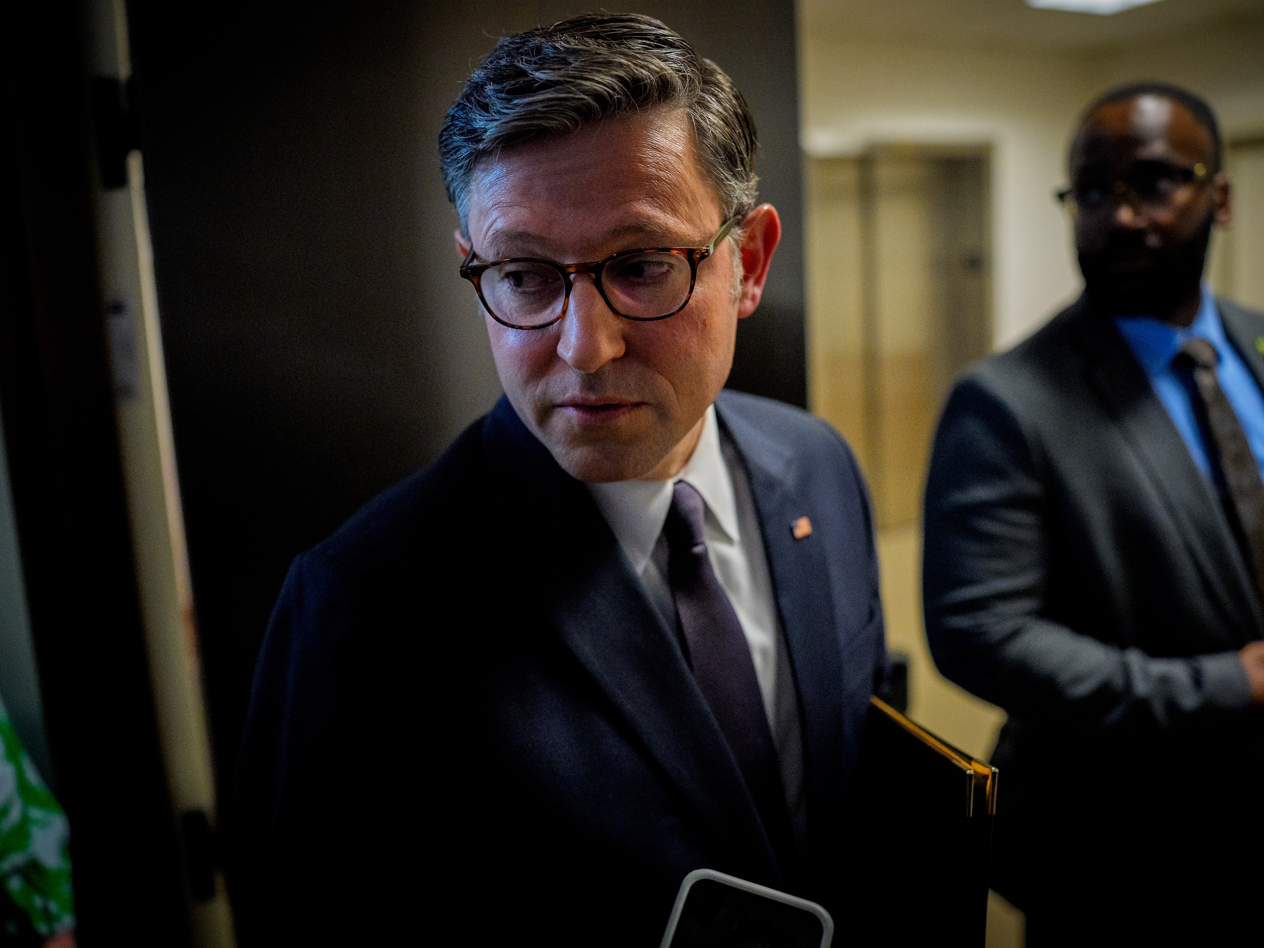 caption: Speaker of the House Rep. Mike Johnson, R-La., speaks to reporters following a House Republican conference meeting at the U.S. Capitol on May 6. Republicans are facing internal divisions over Medicaid as they work to enact President Trump's domestic policy agenda.
