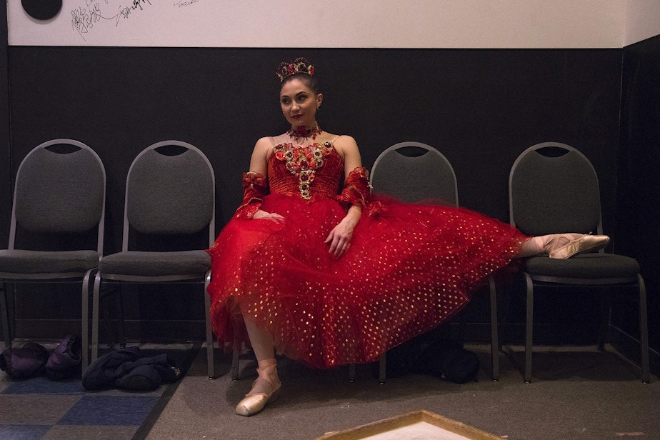 caption: Corps de ballet dancer Nancy Casciano rests between acts backstage during the Pacific Northwest Ballet's performance of Cinderella on Saturday, February 1, 2020, at McCaw Hall in Seattle.