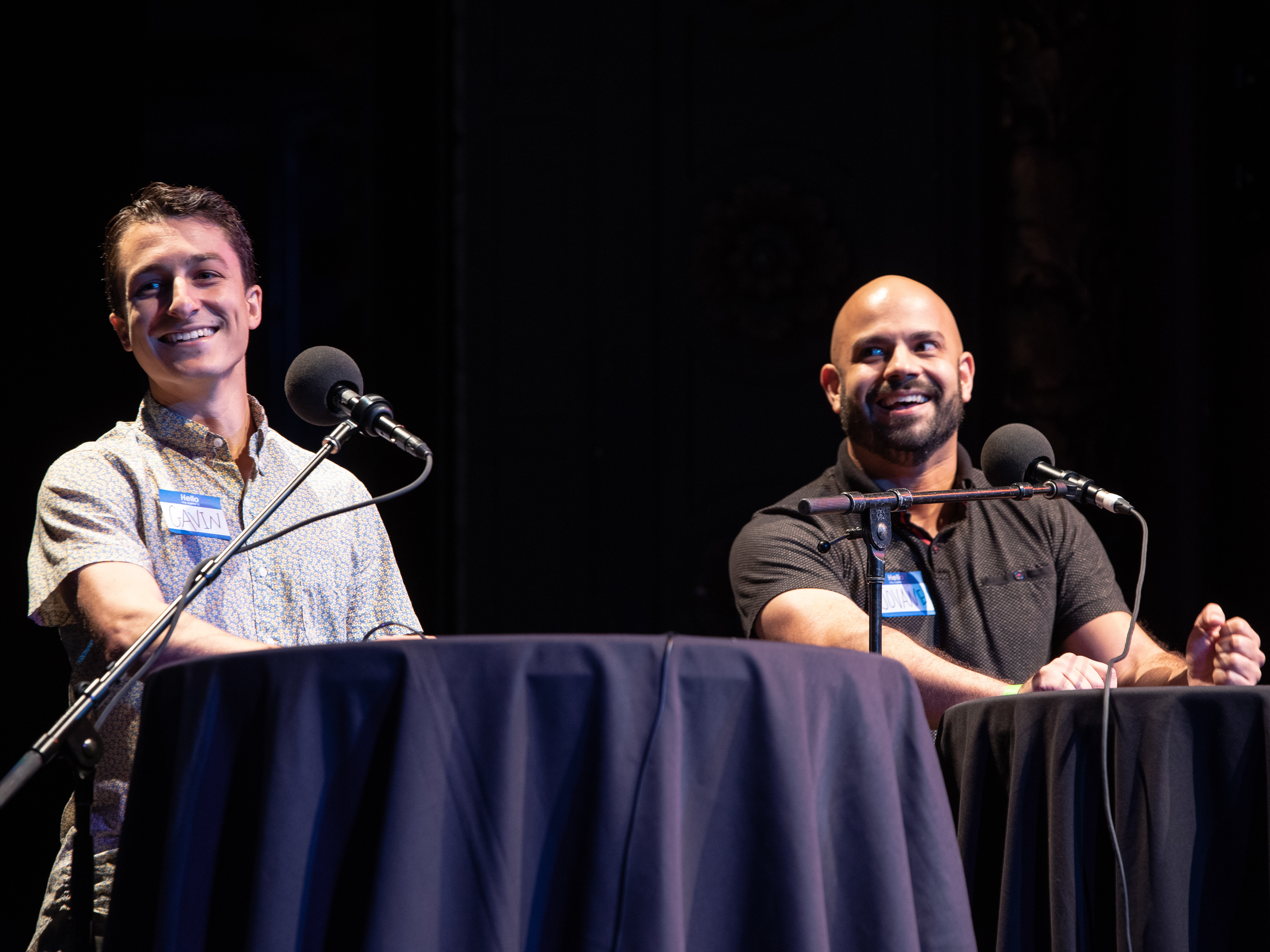 caption: Contestants Gavin Maestas and Jovane Caamaño appear on <em>Ask Me Another </em>at the Majestic Theatre in Dallas, Texas.