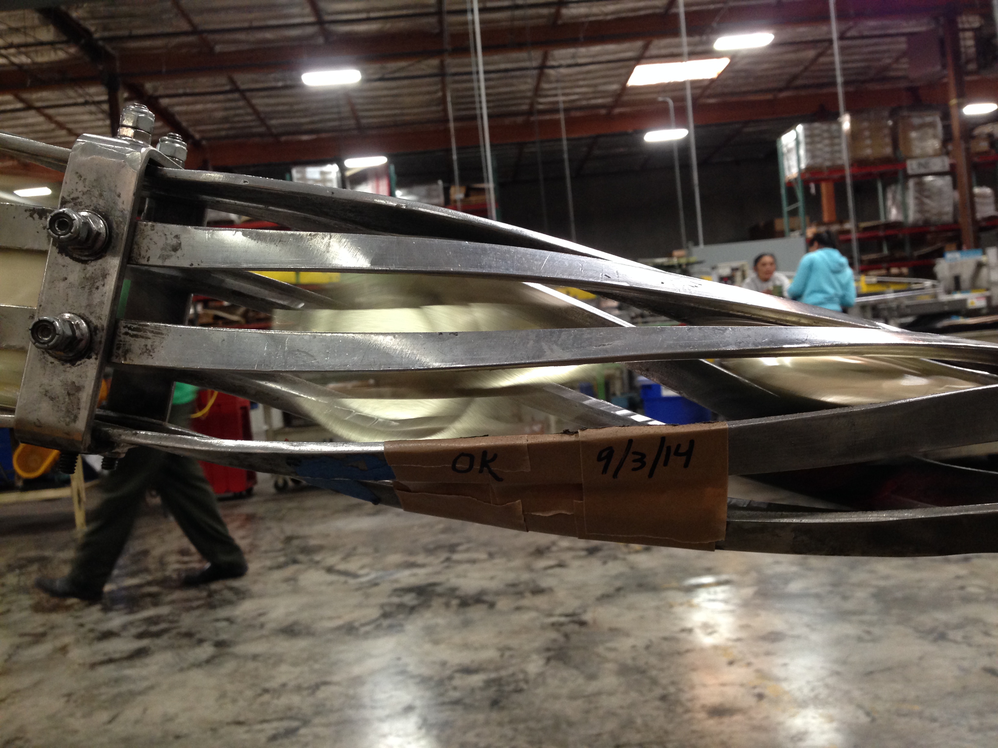 caption: Newly labelled canned salmon, ready to fly out the door.