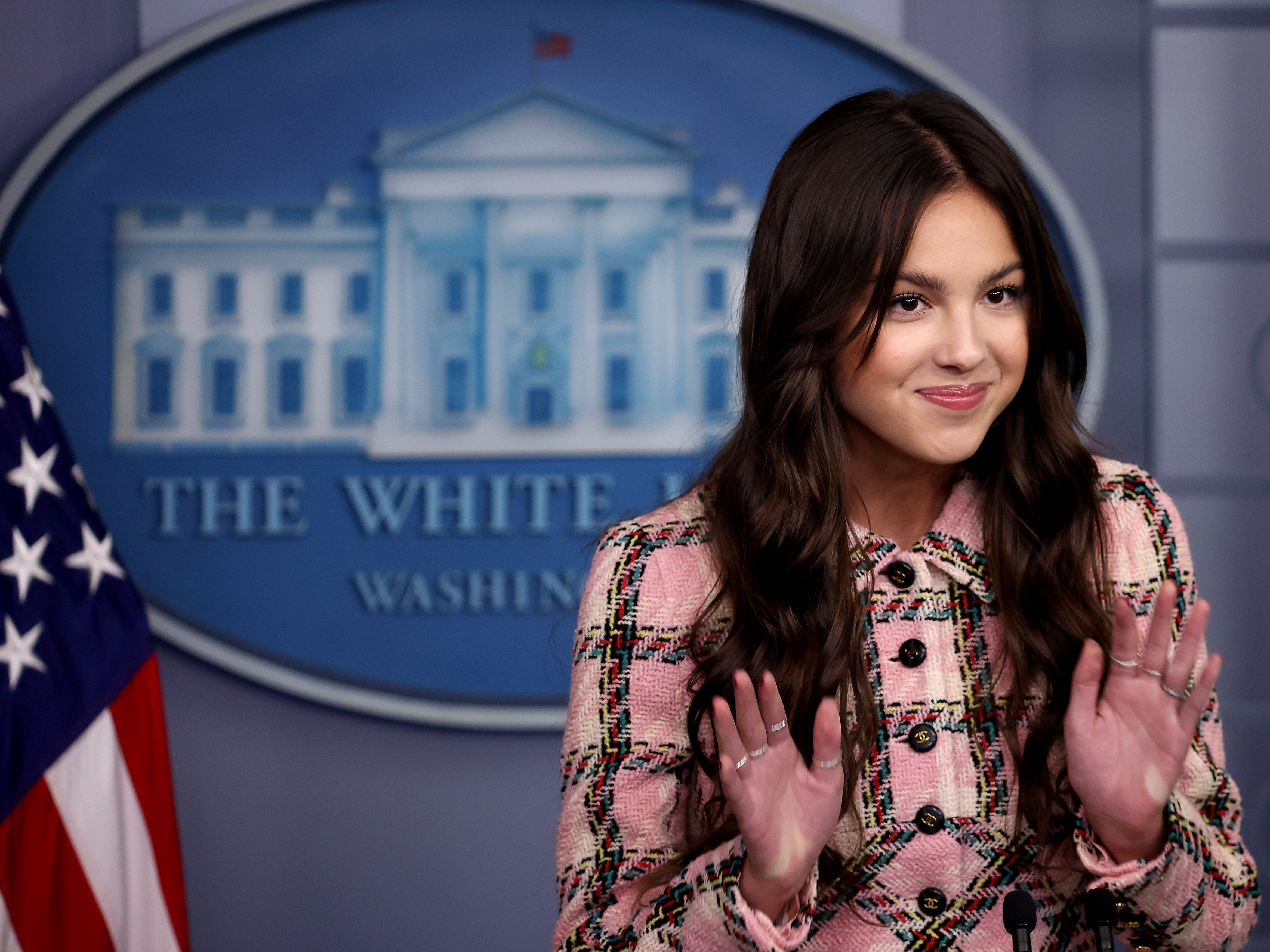 caption: Pop star Olivia Rodrigo makes a brief statement to reporters in the Brady Press Briefing Room at the White House.