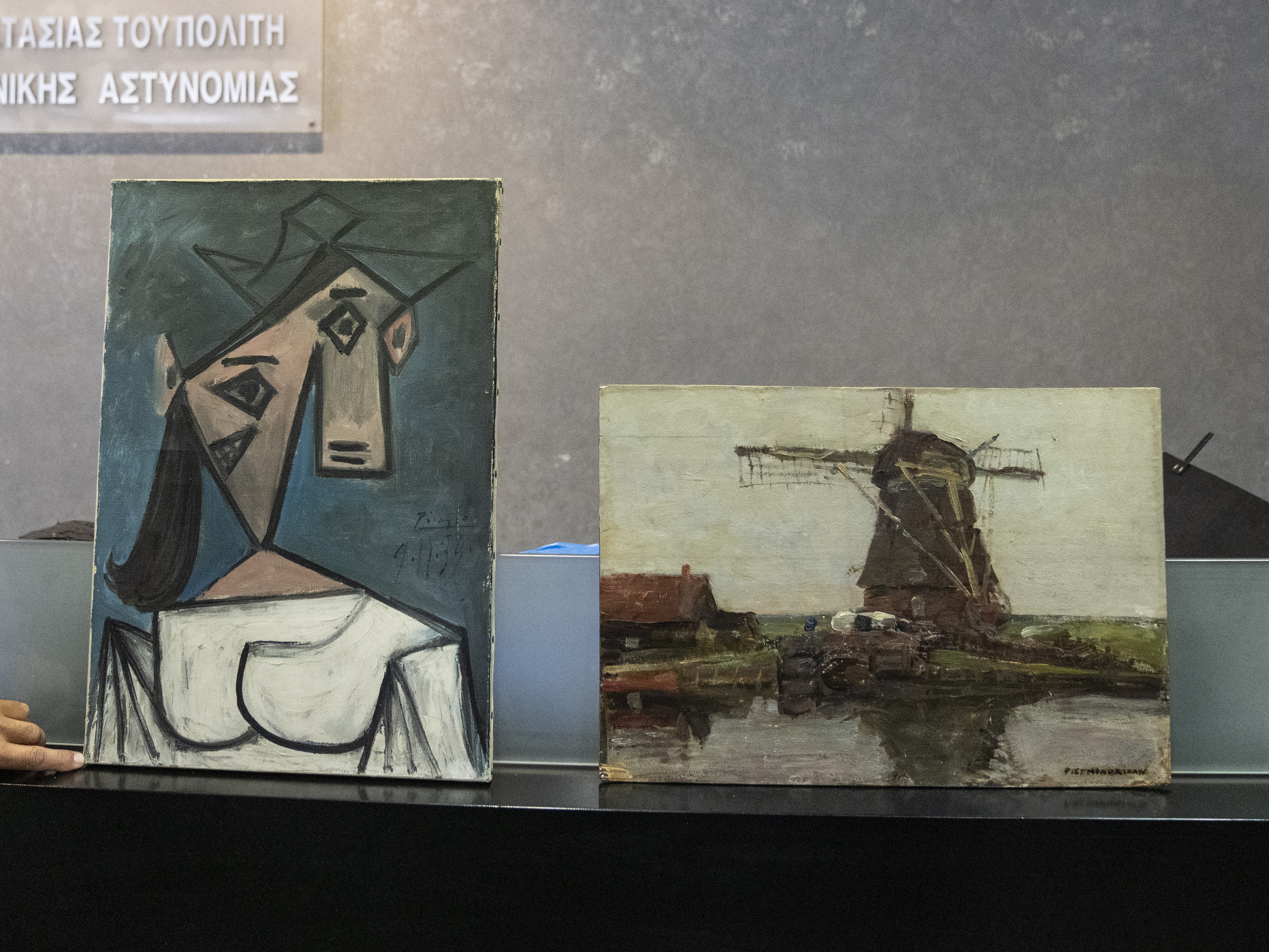 caption: Greek police says they have recovered two paintings by 20th century masters Pablo Picasso and Piet Mondrian, nearly a decade after their theft from the country's biggest state art gallery in Athens.