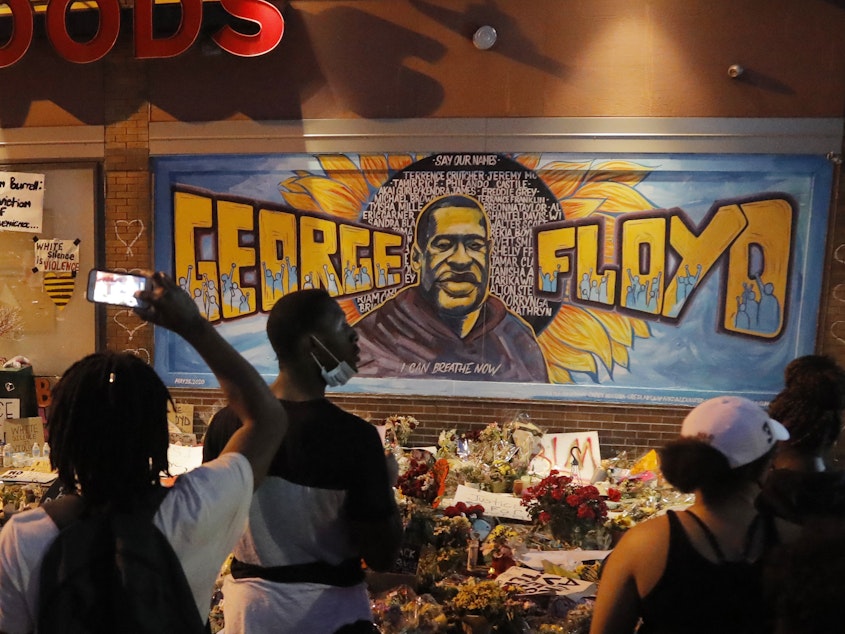 caption: Police in Minneapolis will be banned from using chokeholds and neck restraints after the state filed civil rights charges over the police killing of George Floyd.