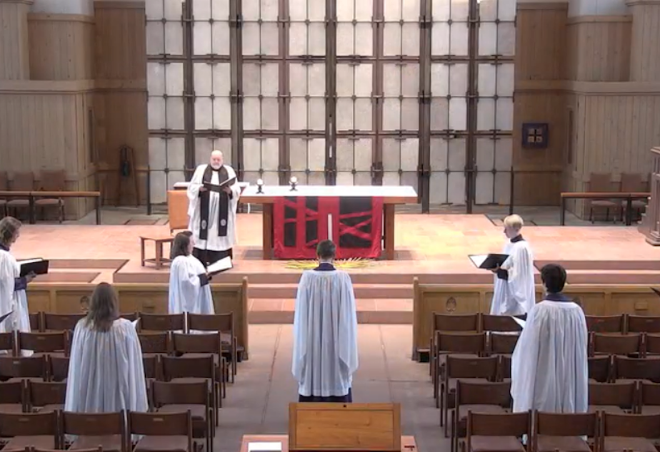 caption: The Evensong Choir is shown social distancing at Saint Mark's Episcopal Cathedral in Capitol Hill on Palm Sunday.
