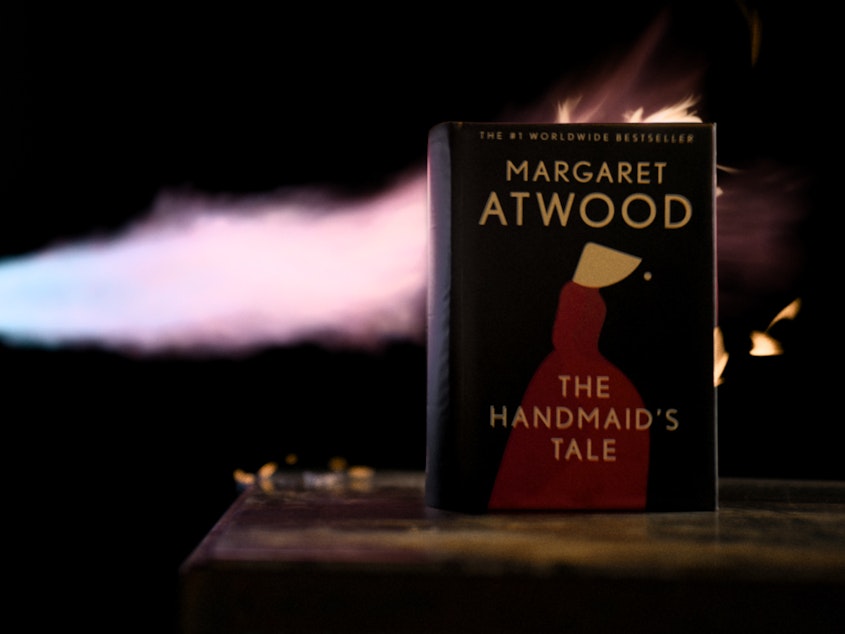 caption: Sotheby's is auctioning a special, fireproof copy of Margaret Atwood's dystopian novel <em>The Handmaid's Tale</em>. Proceeds will go to support PEN America's work opposing book bans.