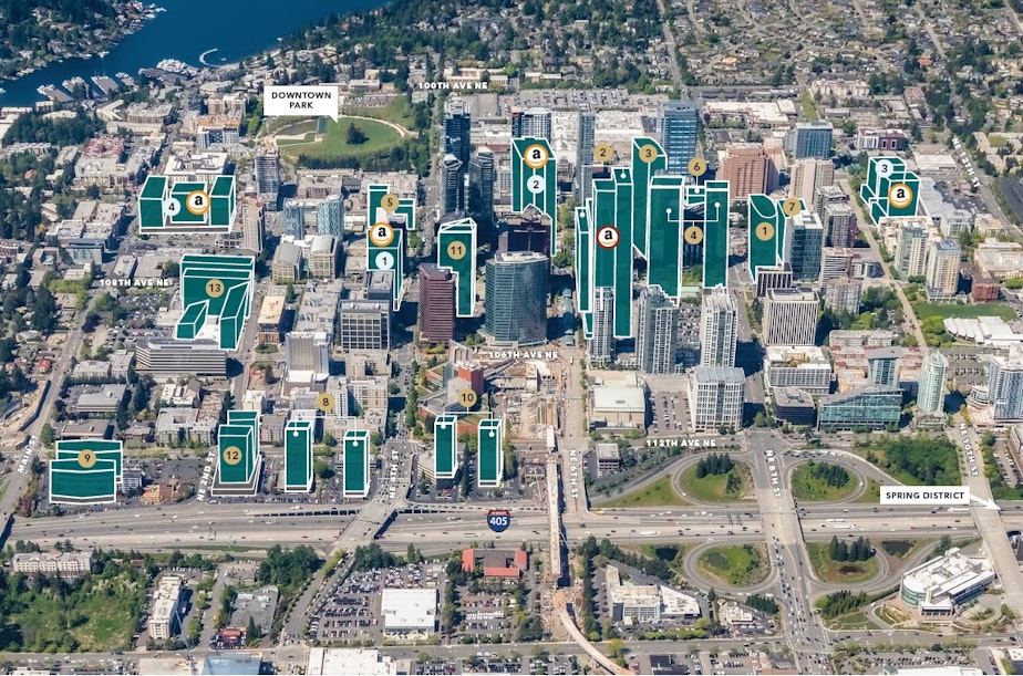 caption: A detail from Kidder Mathews map showing projects under development in Bellevue. The map also highlights Amazon leased and owned properties.