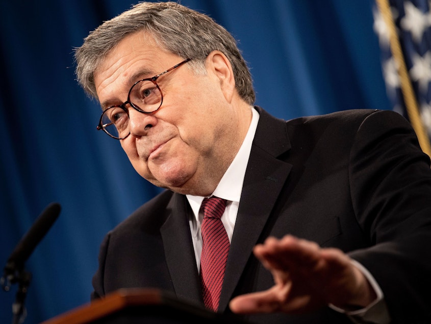 caption: Attorney General William Barr speaks during a press conference about the release of the special counsel report at the Department of Justice on April 18. Barr is testifying on Capitol Hill on Wednesday and Thursday.