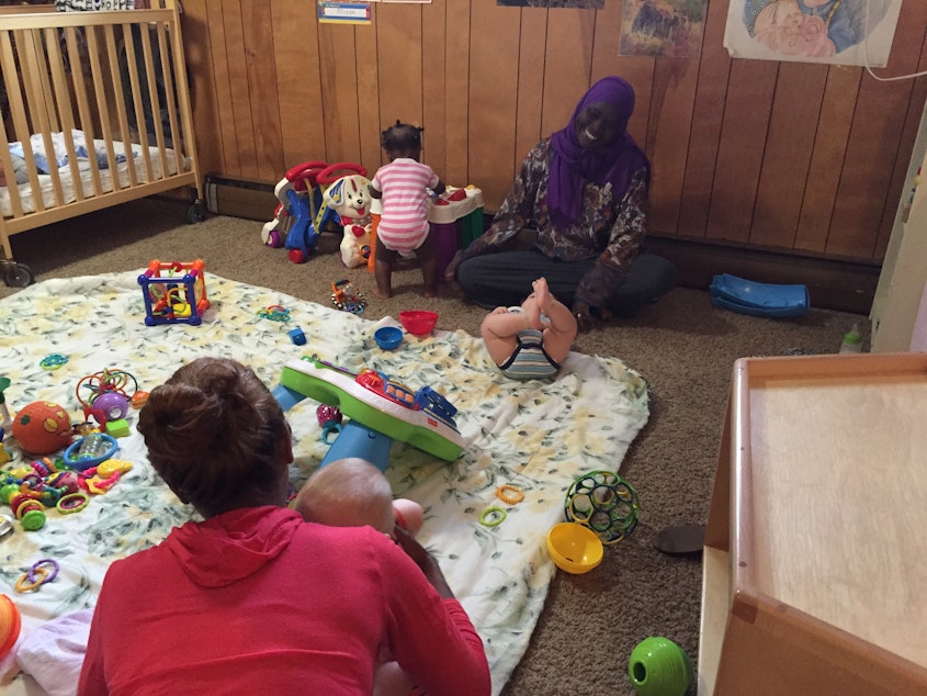 caption: The infant room at Learning Way School & Daycare in White Center, where director Jeri Finch says she does her best to make sure parents update their children's immunization records regularly. 