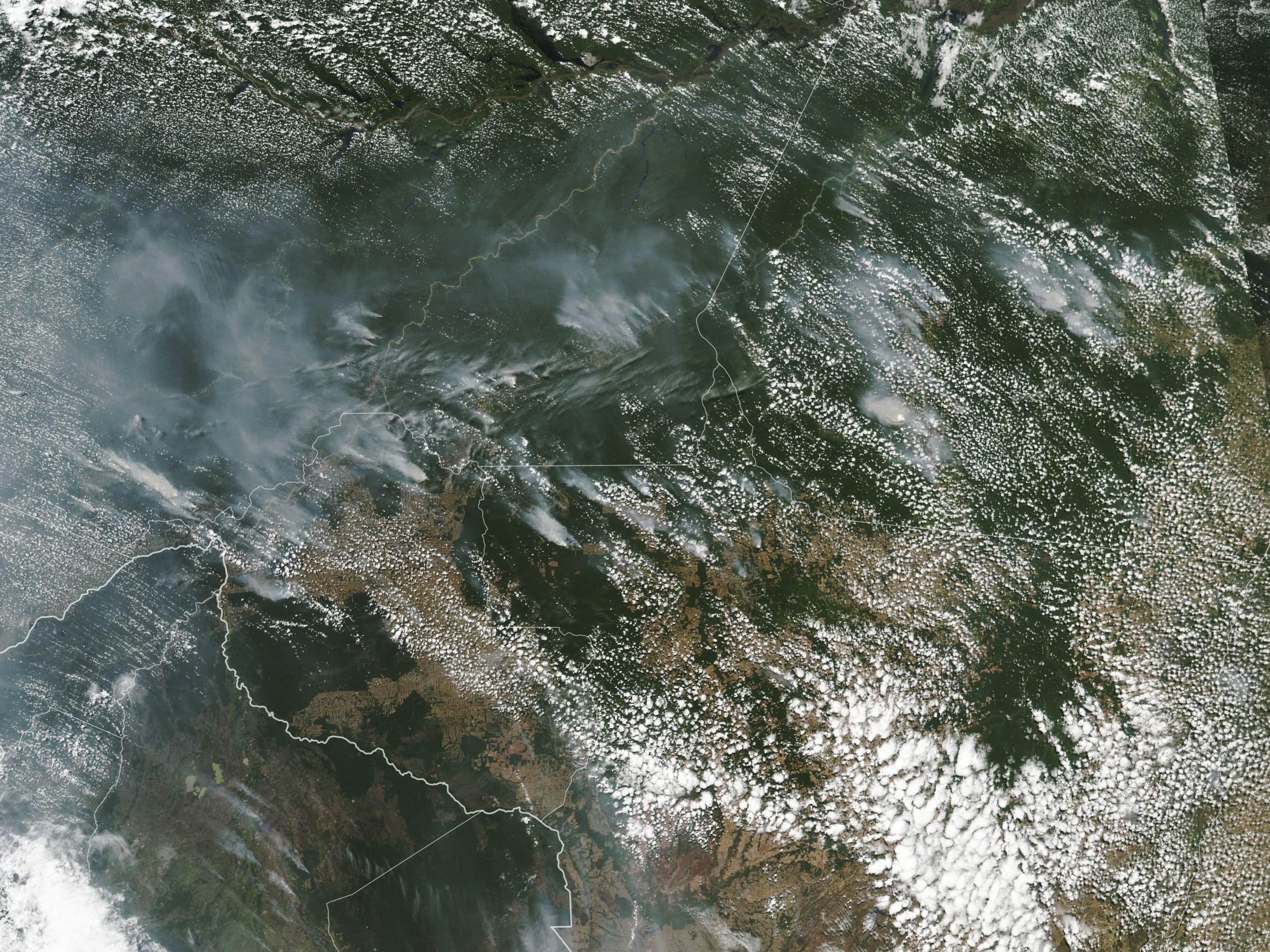 caption: Several of the fires burning in the Amazon rainforest can be seen even from space, as evidenced by this satellite image provided by NASA earlier this month. Brazil's National Institute for Space Research said the country has seen a record number of wildfires this year.