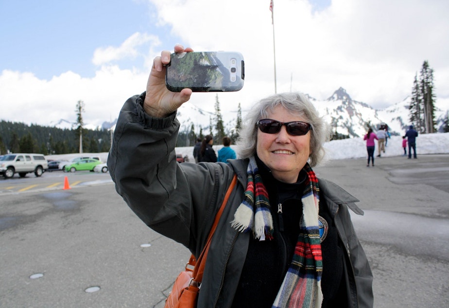 caption: Geologist Carolyn Driedger outside the visitor center at Mount Rainier National Park.