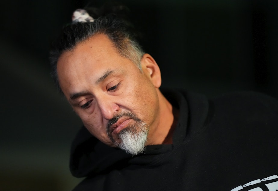 caption: Richard Fierro talks during a news conference outside his home Monday about his efforts to subdue the gunman in Saturday's fatal shooting at Club Q in Colorado Springs, Colo.