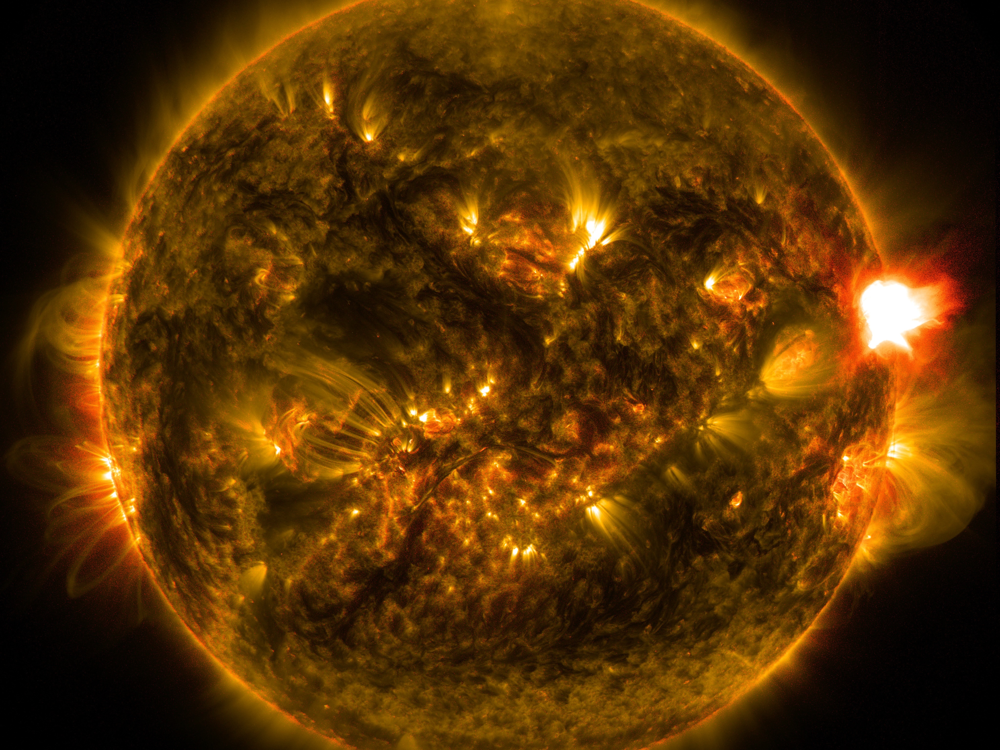 caption: NASA's Solar Dynamics Observatory, which watches the sun constantly, captured an image of a mid-level solar flare on Jan. 12, 2015.