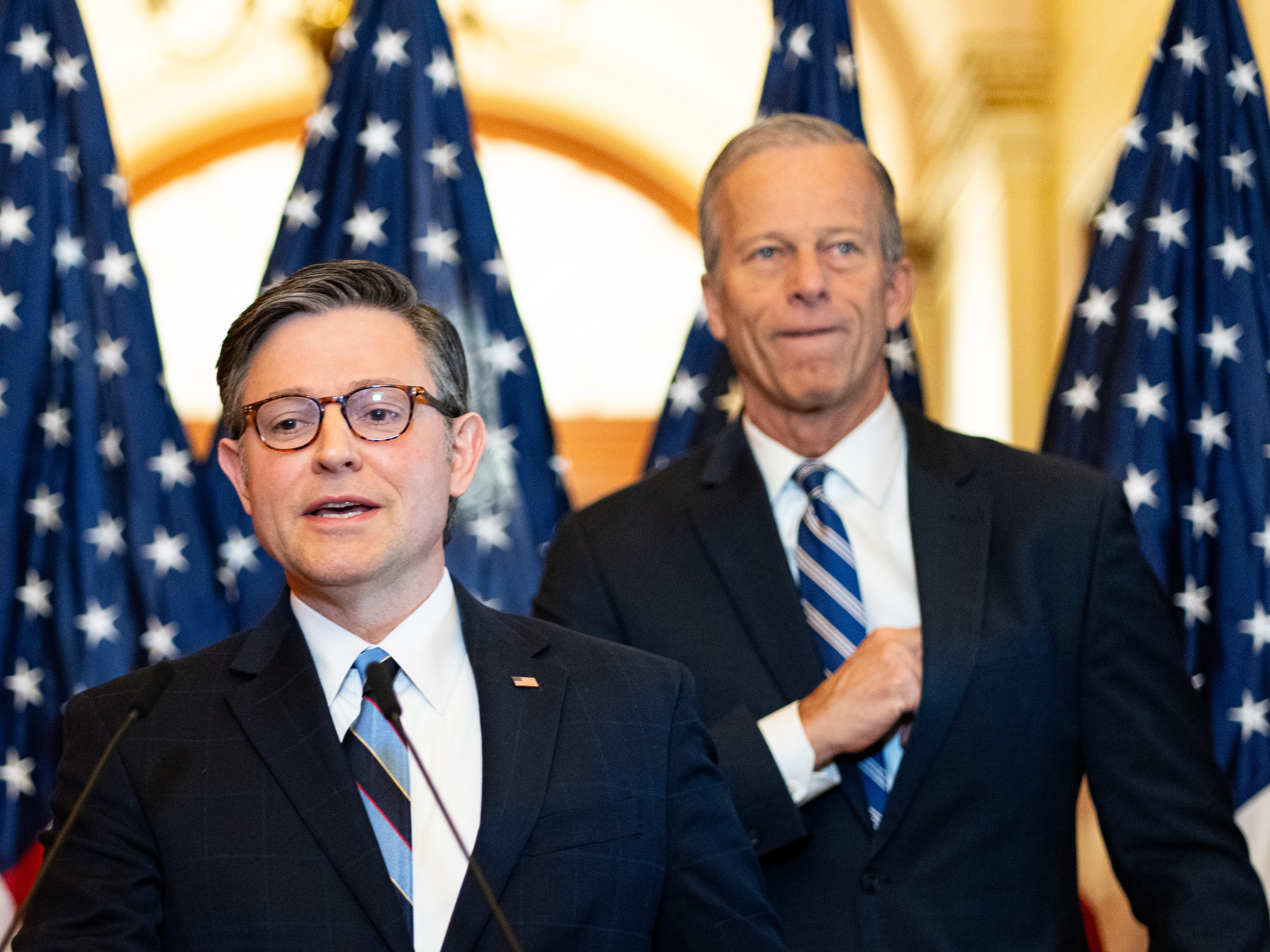 caption: Speaker of the House Mike Johnson, R-La., left, and Senate Majority Leader John Thune, R-S.D., hold a news conference on passing the budget resolution in the U.S. Capitol on April 10, 2025. (Bill Clark/CQ-Roll Call, Inc via Getty Images)