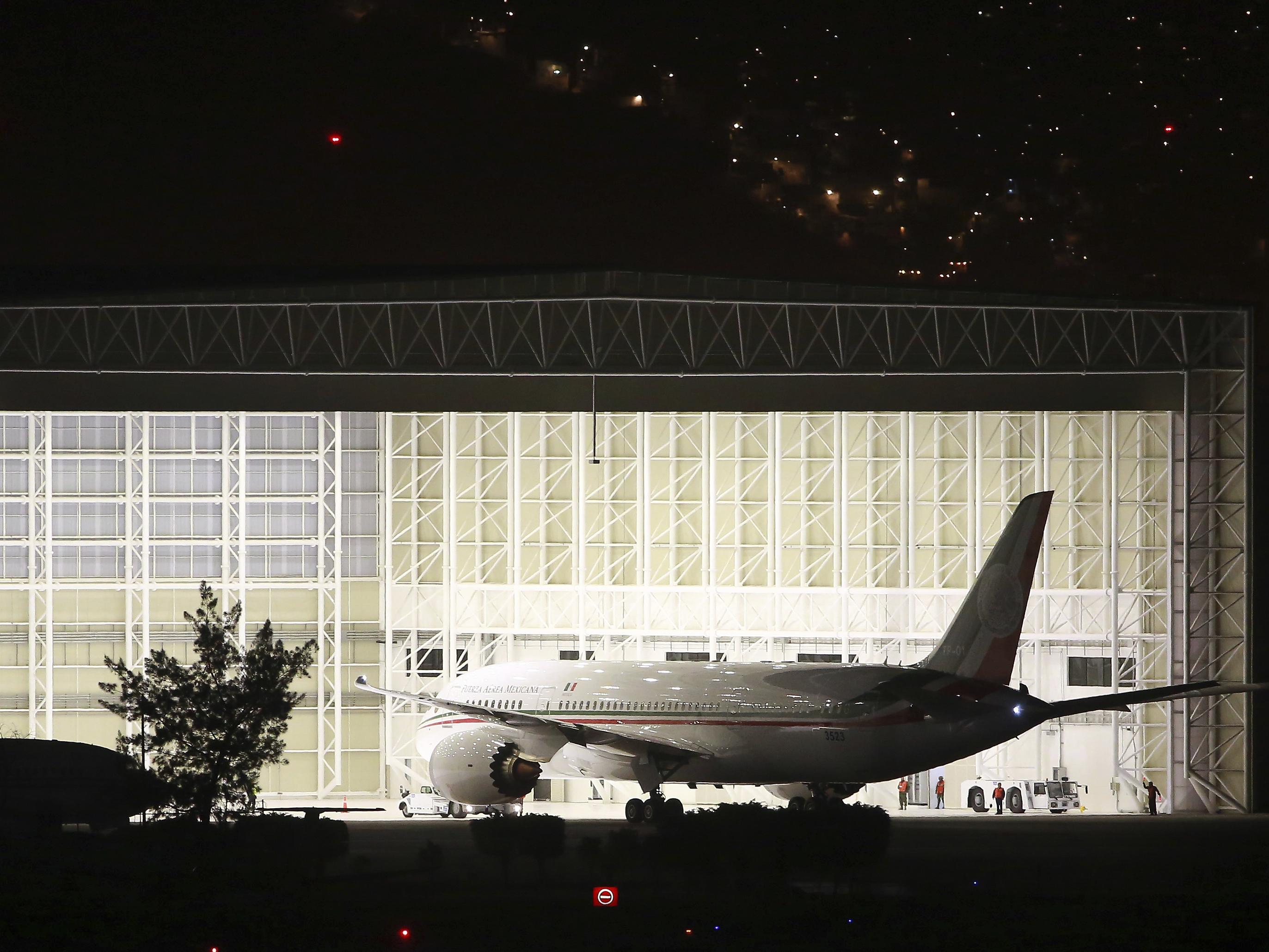 caption: Mexico's presidential plane, a Boeing 787-8 Dreamliner called the Jose Maria Morelos y Pavon, arrives at Benito Juarez International Airport in Mexico City in February 2016, when it was brand new. The airplane was one of the most expensive presidential airplanes in the world. Mexico's next president is trying to sell it.