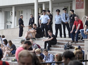 caption: The U.S.-based Free Russia Foundation accuses Russia of exploiting Western legal systems. Above, supporters of arrested journalist Ivan Golunov (freed on Tuesday) gathered at a court building in Moscow.