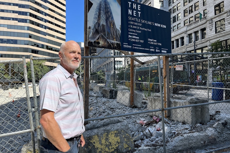 caption: Greg Smith, next to the site where he plans to build a highrise on 3rd Avenue