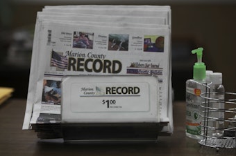 caption: The last printed issue of the Marion County Record sits in a display in its office, Sunday, Aug. 13, 2023, in Marion, Kan. Editor and Publisher Eric Meyer says the newspaper will publish its regular weekly issue on Aug. 16, 2023, despite a raid by local law enforcement officers and the seizure of computers and cell phones. (AP Photo/John Hanna)
