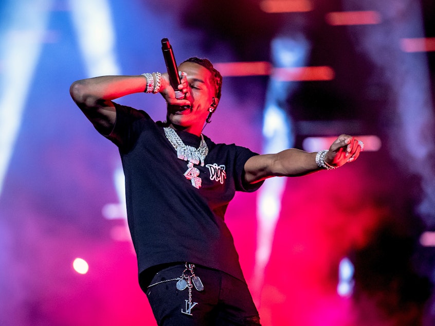 caption: Lil Baby performs a livestreamed concert on Sept. 2, 2020, as part of the <em></em>Red Rocks Unpaused festival in Colorado.