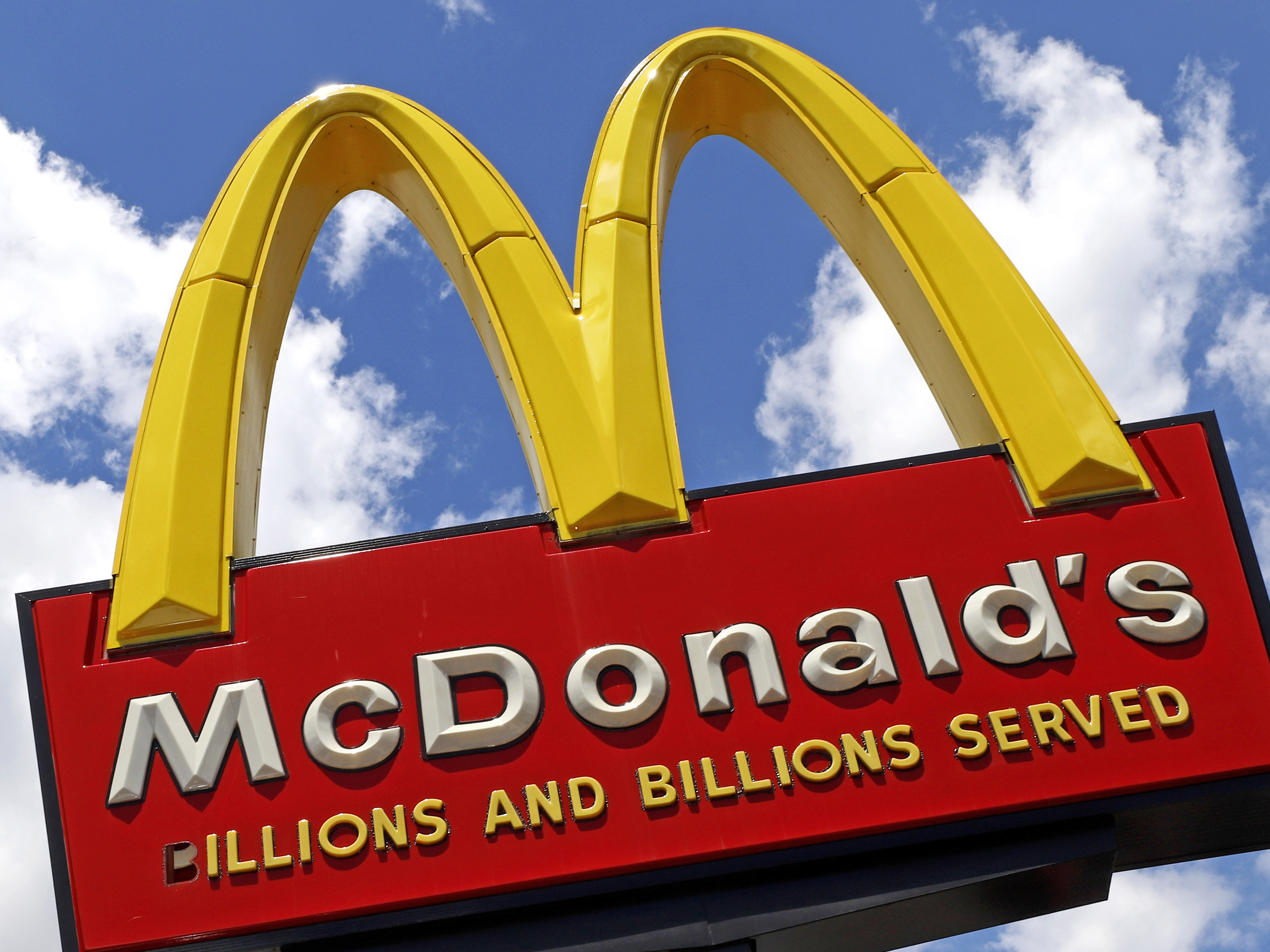 caption: This June 25, 2019, photo shows the sign outside a McDonald's restaurant in Pittsburgh.