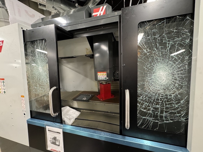 caption: Damage allegedly done by protesters to machinery in UW's Fabrication Studio inside the Interdisciplinary Engineering Building.