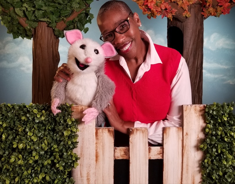 caption: Auntie Lena and Possum of the Seattle children's show Look, Listen and Learn.