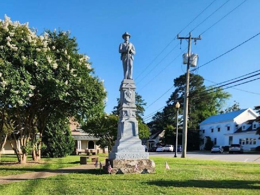 caption: A Confederate statue in front of the courthouse in Columbia, N.C., with a plaque on the bottom that reads: “IN APPRECIATION OF OUR FAITHFUL SLAVES.”