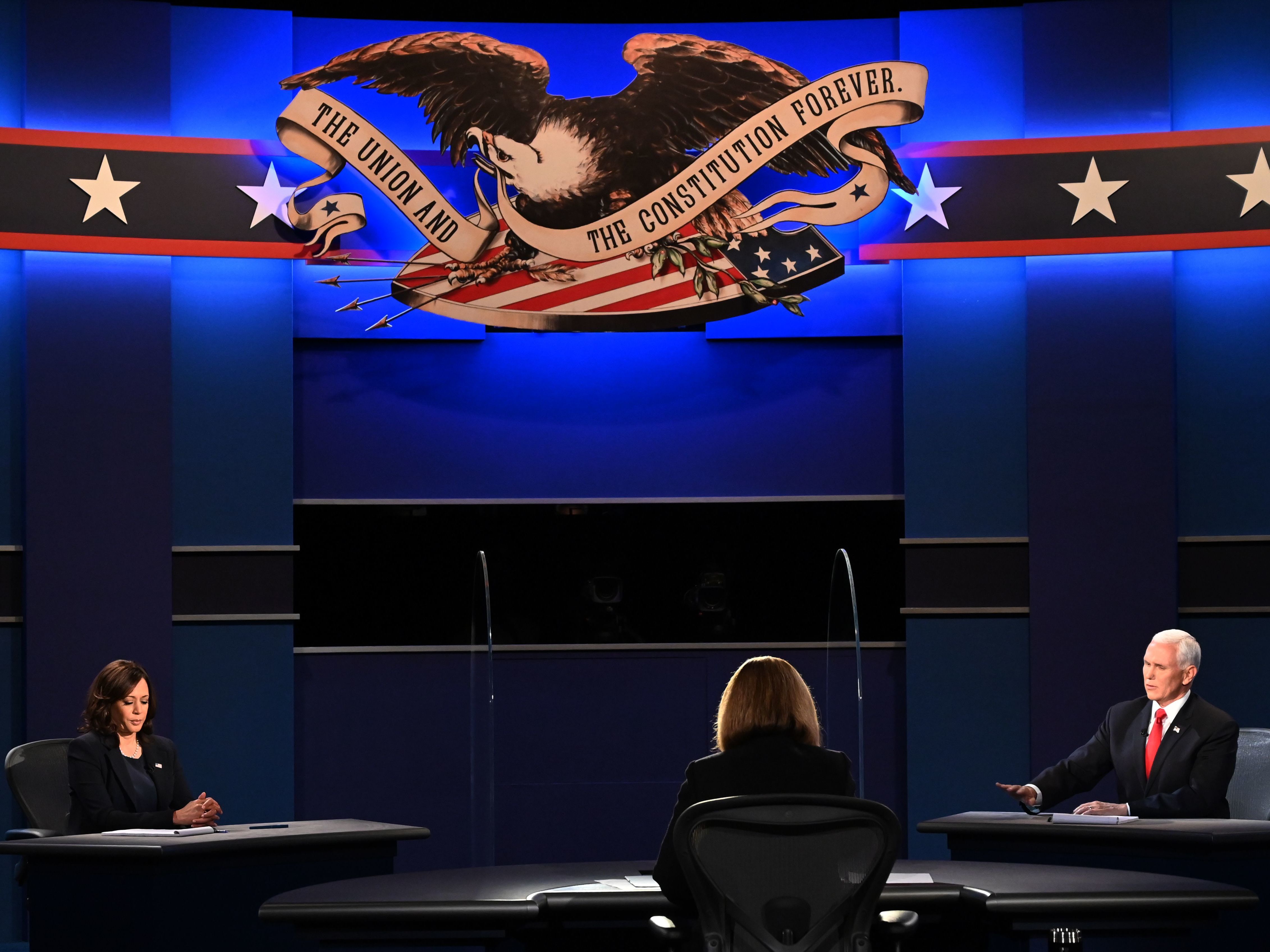 caption: Vice President Pence speaks during the vice presidential debate with Democratic vice presidential nominee Sen. Kamala Harris, D-Calif., at the University of Utah in Salt Lake City on Wednesday.