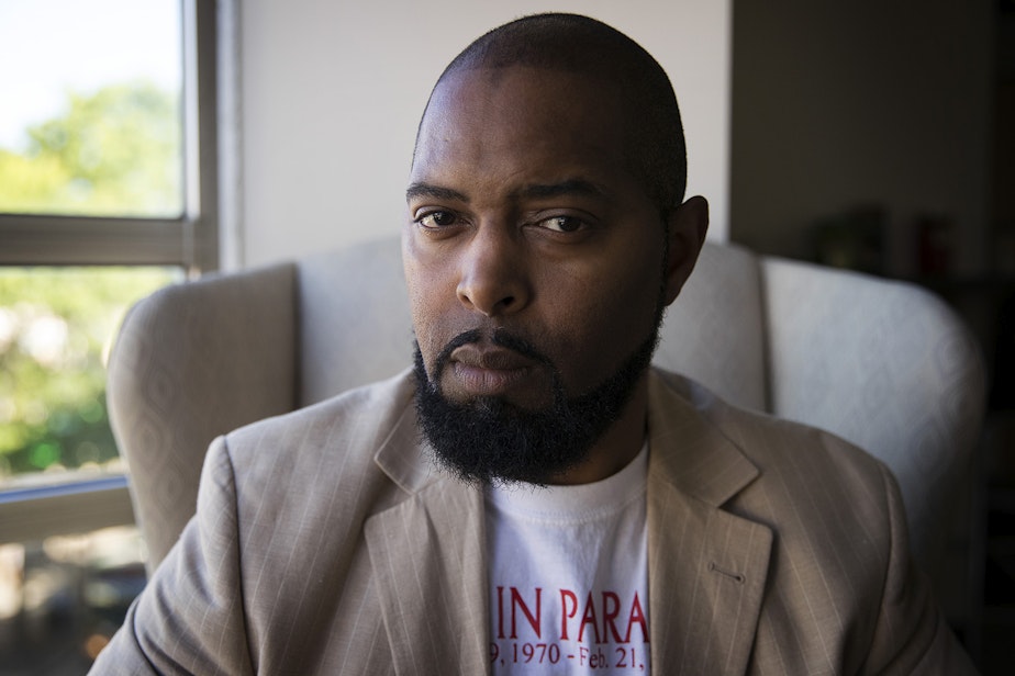 caption: Andre Taylor's brother Che Taylor was shot and killed by police in 2016. Now he is working on an initiative that would change Washington's use of deadly force law.