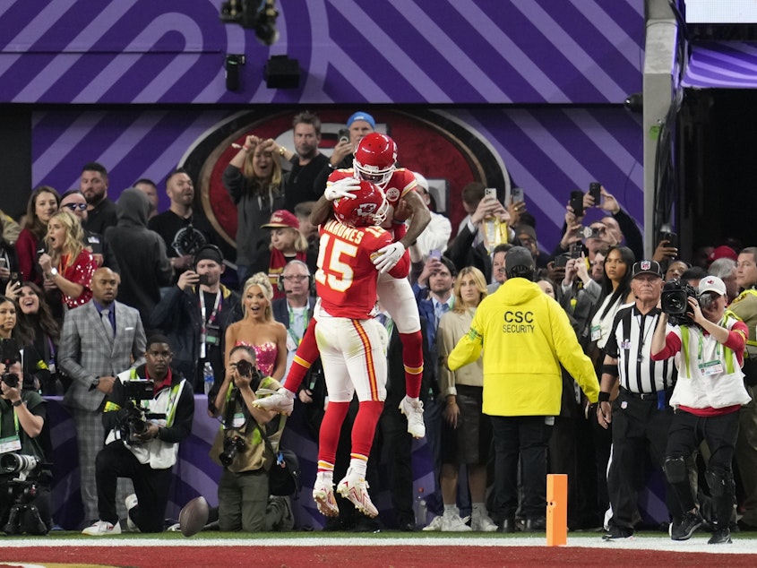 caption: Kansas City Chiefs wide receiver Mecole Hardman Jr. (12) celebrates his game-winning touchdown with quarterback Patrick Mahomes (15) in overtime during the NFL Super Bowl 58 football game against the San Francisco 49ers, Sunday, Feb. 11, 2024, in Las Vegas. The Chiefs won 25-22.