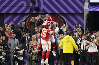 caption: Kansas City Chiefs wide receiver Mecole Hardman Jr. (12) celebrates his game-winning touchdown with quarterback Patrick Mahomes (15) in overtime during the NFL Super Bowl 58 football game against the San Francisco 49ers, Sunday, Feb. 11, 2024, in Las Vegas. The Chiefs won 25-22.