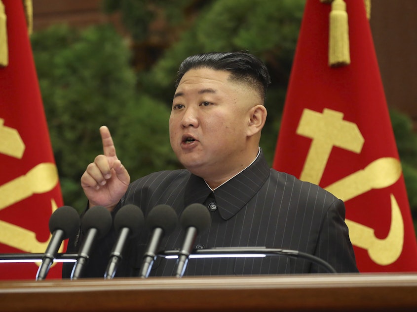 caption: North Korean leader Kim Jong Un speaks during a Politburo meeting of the ruling Workers' Party on Tuesday in Pyongyang.