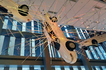 caption: 'Inopportune: Stage One' by Chinese contemporary artist Cai Guo-Qiang is leaving Seattle Art Museum's lobby soon.