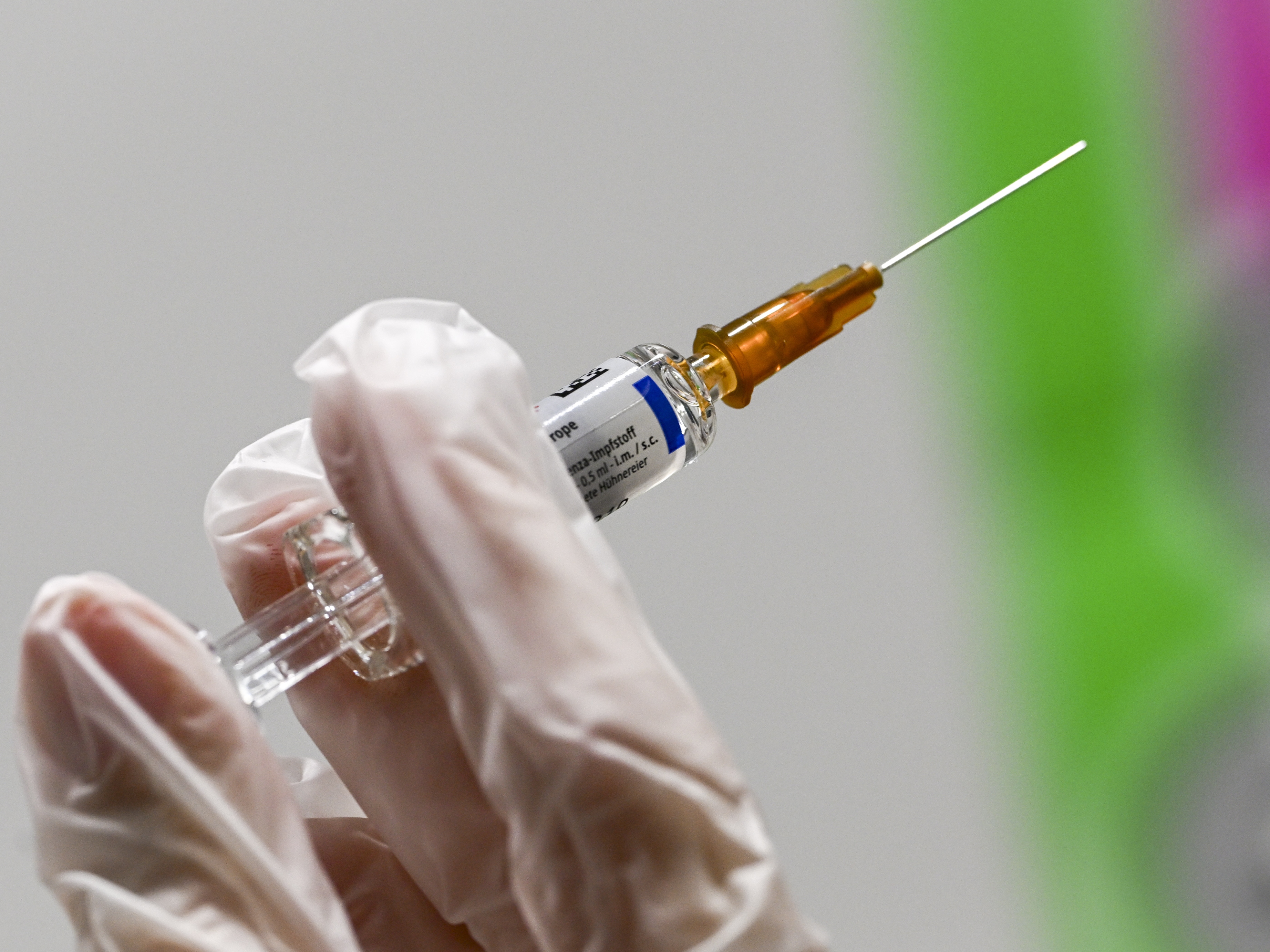 caption: A shot for a flu vaccination. A late February meeting of scientists from around the world is figuring out the recipe for the best vaccine for the upcoming fall flu season.