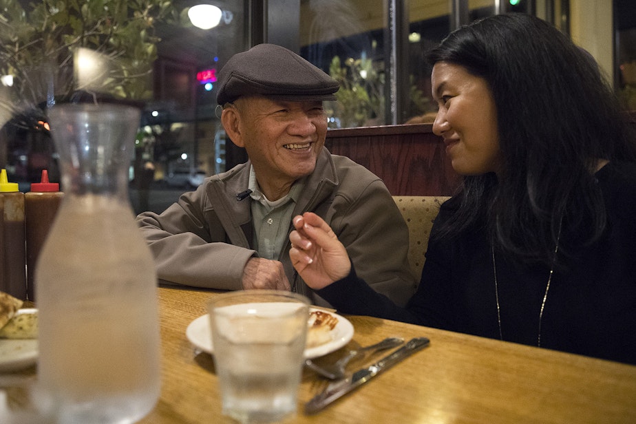 caption: Duc Tan, left, and his daughter, Thanh Tan, laugh while eating at Ramblin Jack's Restaurant on Friday, September 29, 2017, in Olympia. KUOW Photo/Megan Farmer