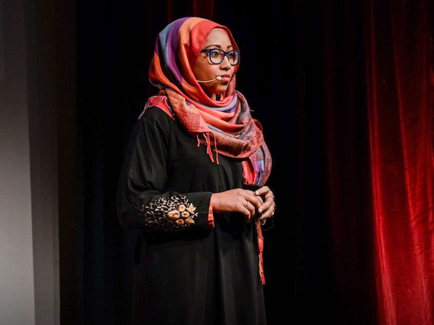 caption: Yassmin Abdel-Magied on the TED stage.