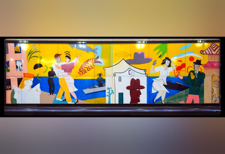 caption: Seattle artist Fay Jones created this mural in the Westlake bus tunnel in the late 1980s.