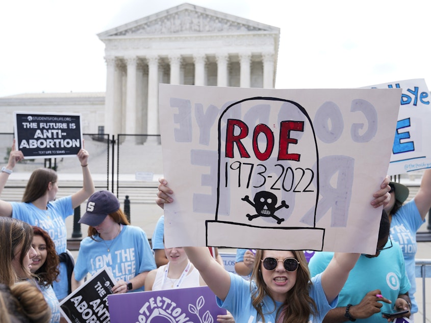 caption: Demonstrators protest about abortion outside the Supreme Court in Washington, June 24, 2022. In the year since, approximately 22 million women, girls and other people of reproductive age now live in states where abortion access is heavily restricted or totally inaccessible.