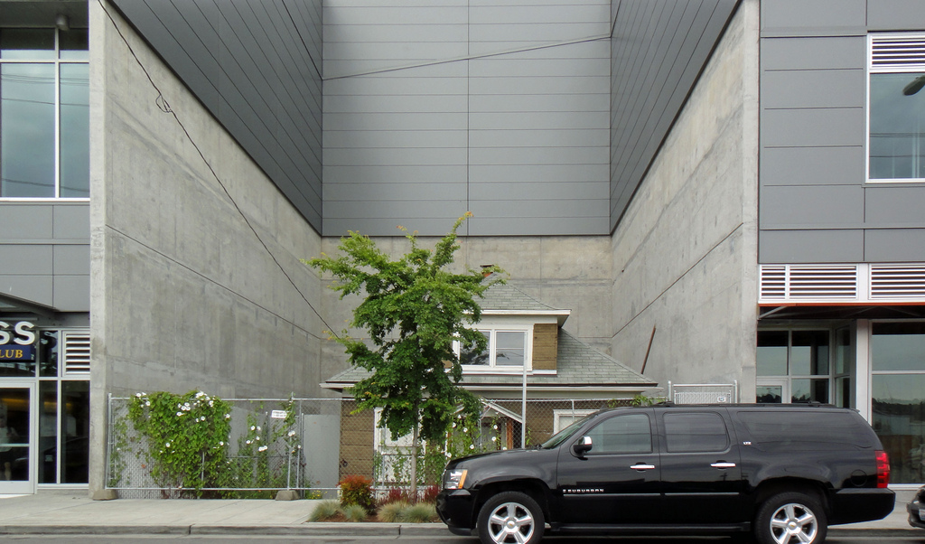 caption: Edith Macefield's Ballard home was surrounded by development .